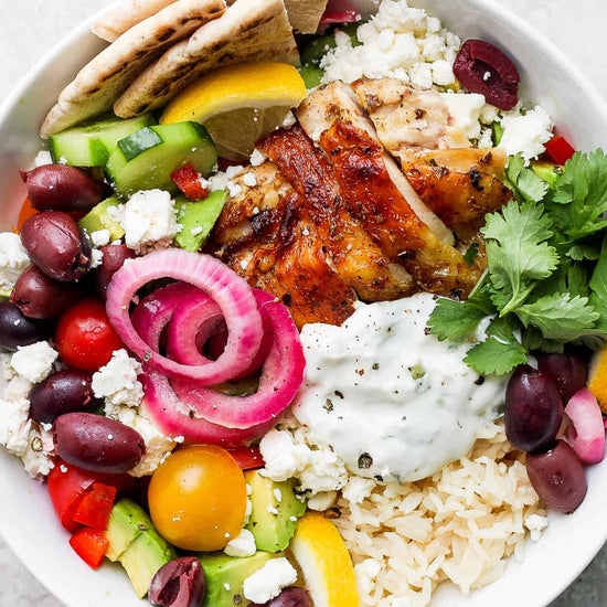 Greek Chicken and Rice Bowl with Salad and Tzatziki